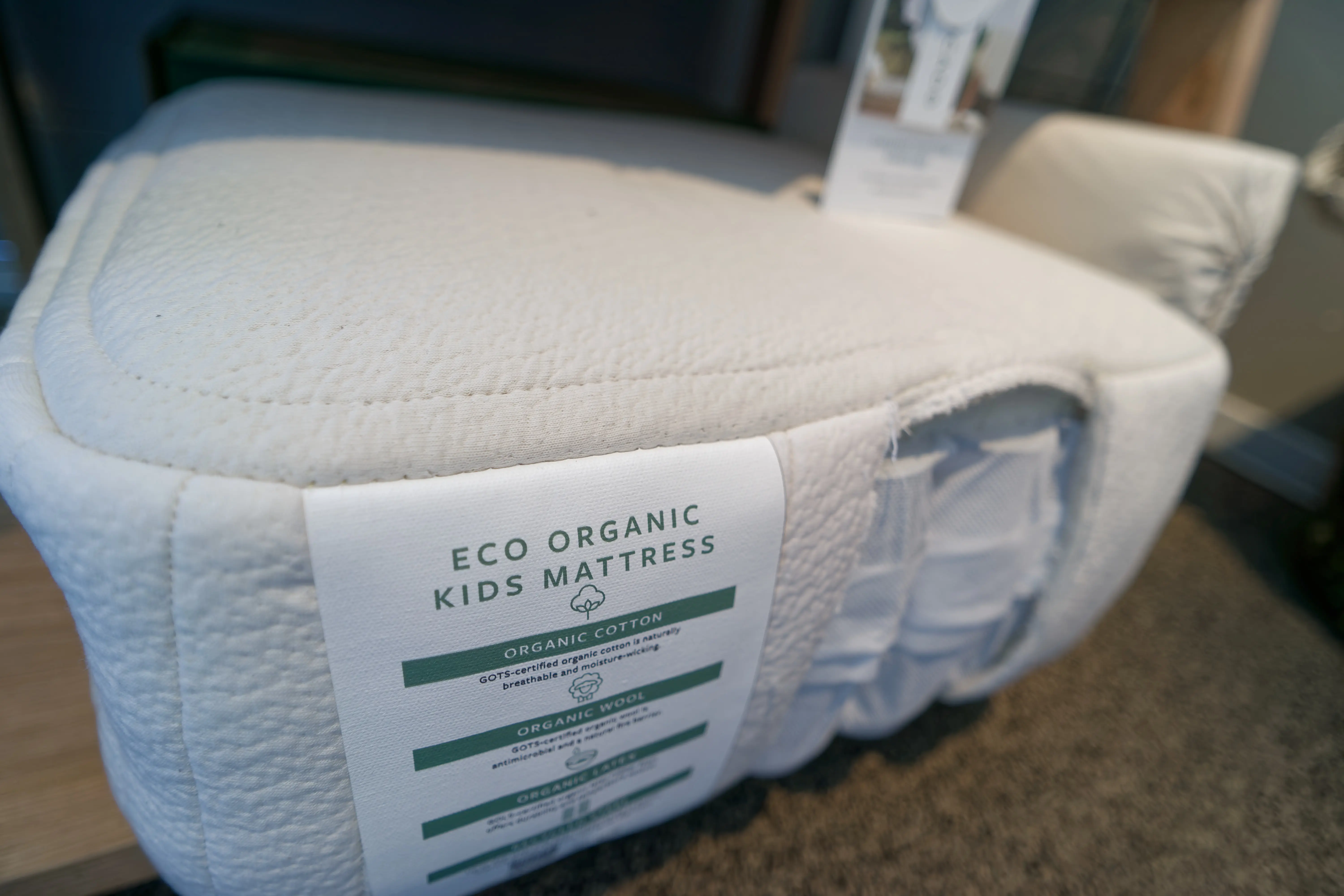 Close-up of Eco Organic Kids mattress tag